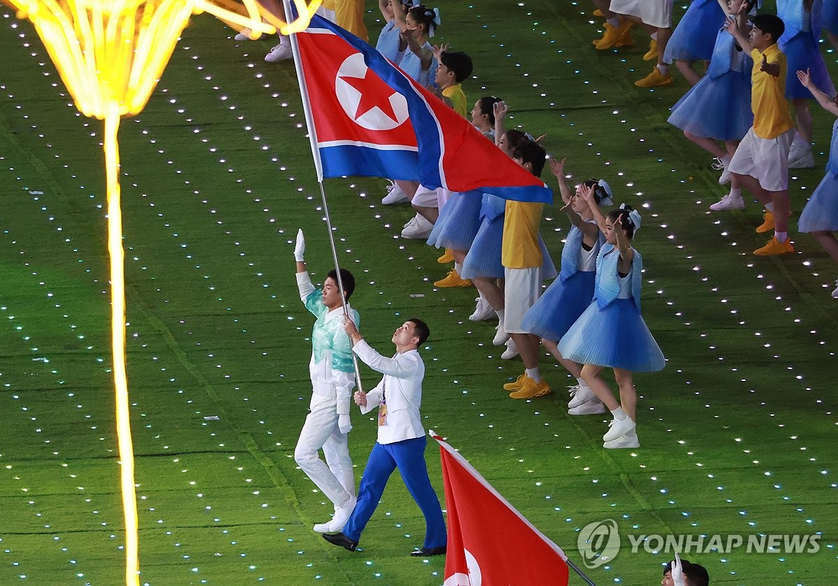North Korea’s closing ceremony flagbearer is only male gold medalist Ri Cheong Song